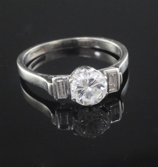 A mid 20th century platinum and single stone diamond ring, size M.